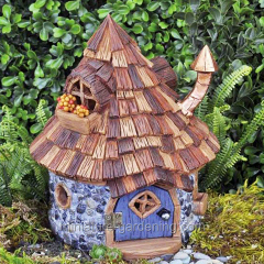 Fairy house with cedar shake roof